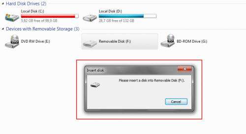 ["Please insert a disk into Removable Disk (F:).]